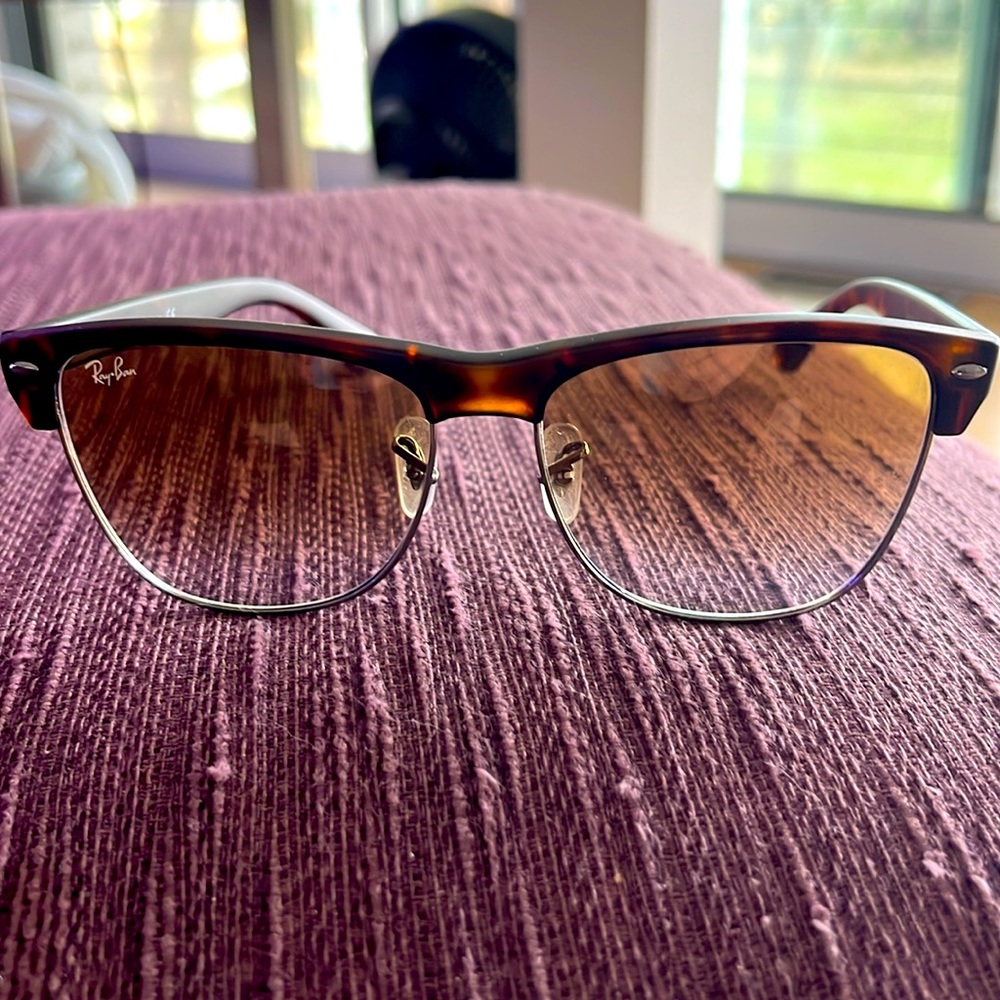 Ray Bans- with brown gradient lens with tortoise frame.